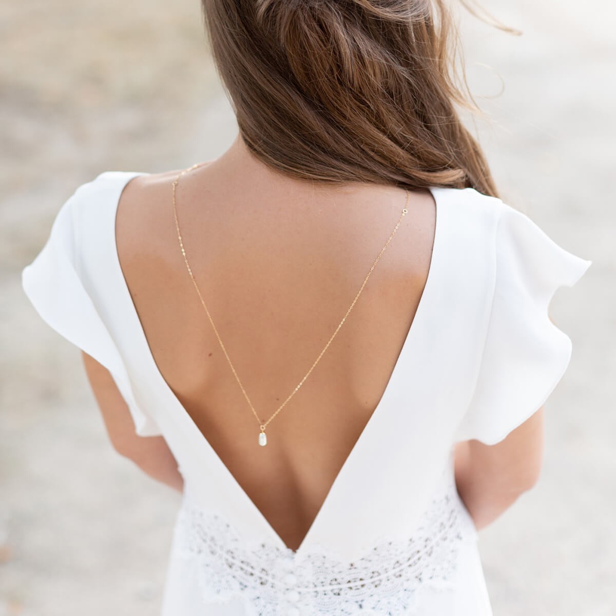 Collier bijou de dos de mari e