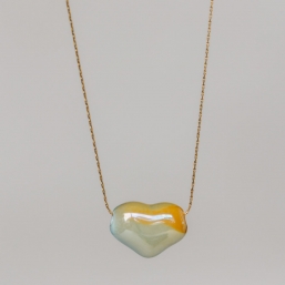 "Coeur naturel" Collier avec un coeur traversant en céramique